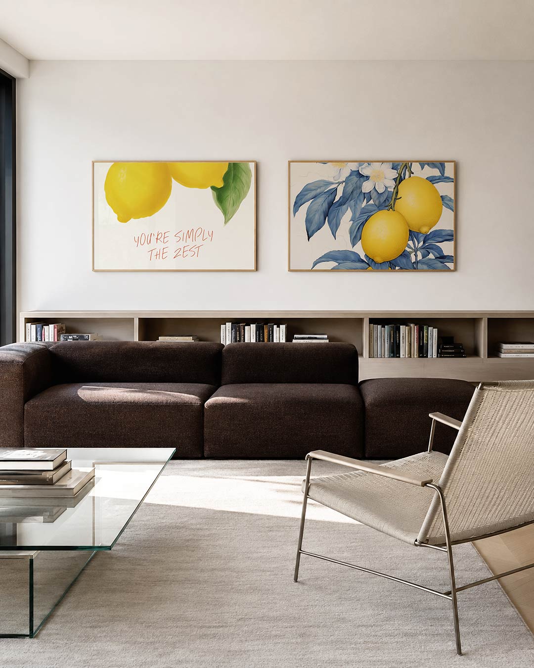 Twee liggende posters met gele citroenen met groene bladeren en de rode tekst ‘YOU’RE SIMPLY, aan de muur in een interieur