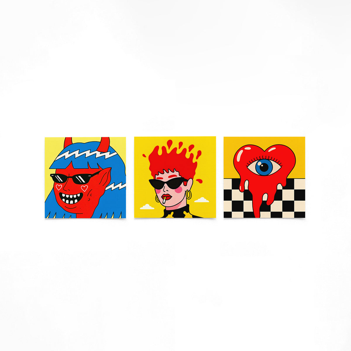 Drie vierkante posters met popart portretten op een gebroken witte achtergrond
