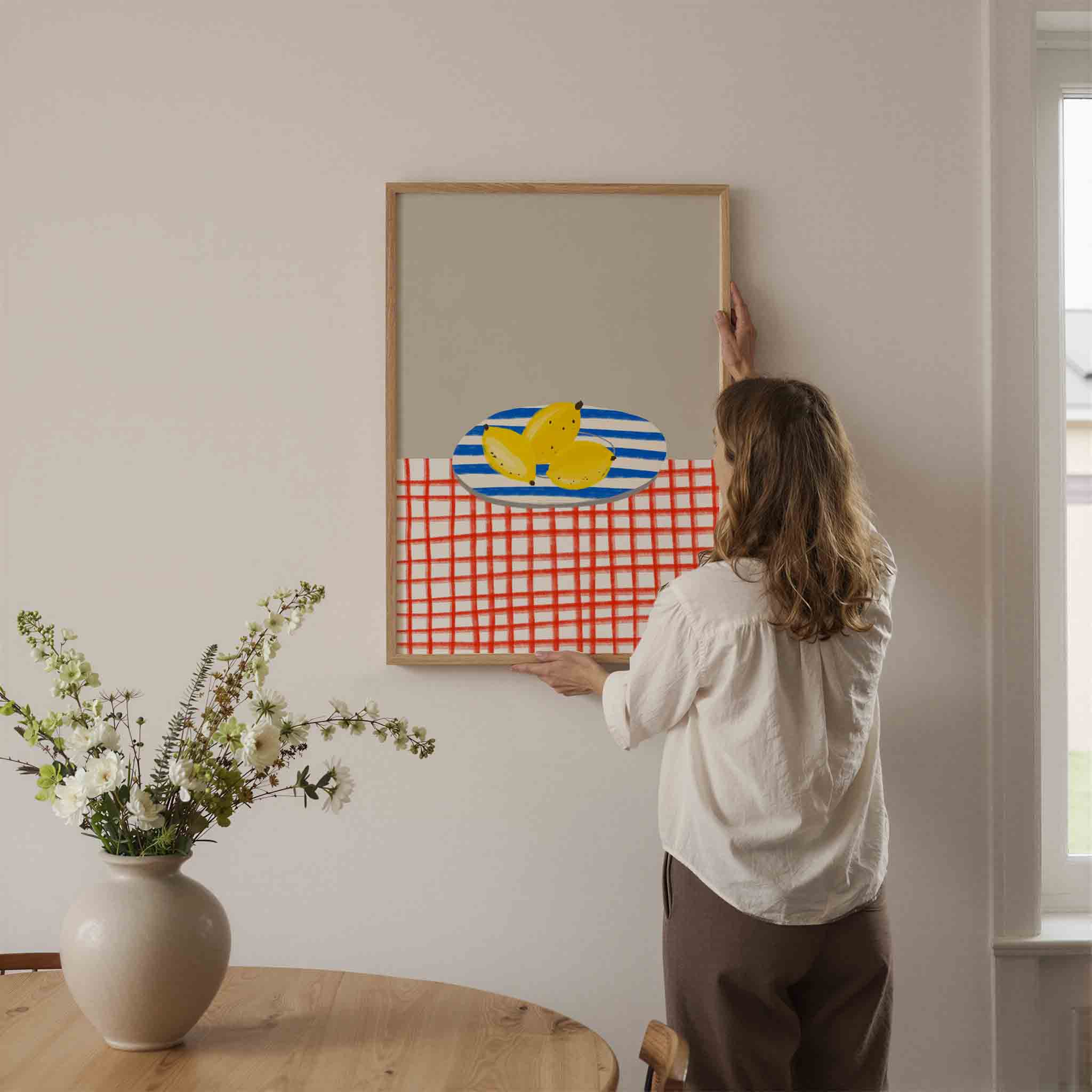 Bananen op gestreept bord Poster