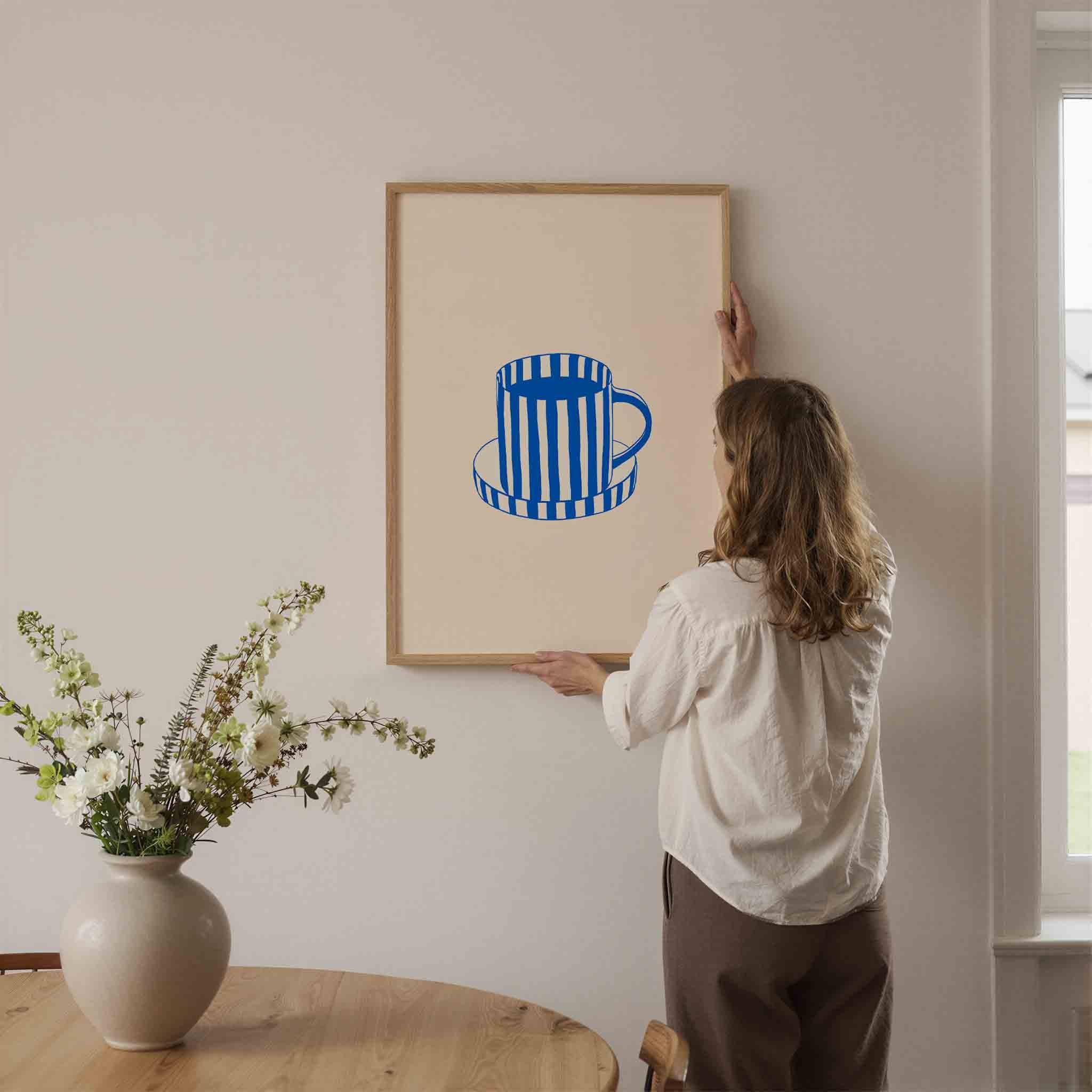 Gestreepte kop en schotel Poster
