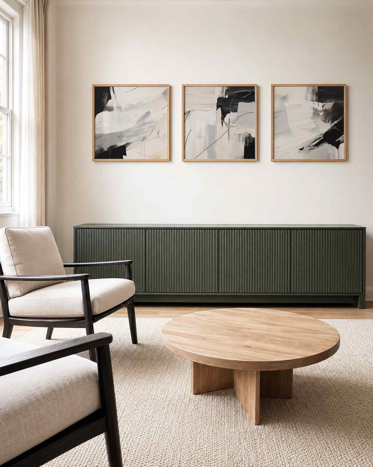 Interieurpresentatie van een driedelige vierkante posterset met zwart wit abstract