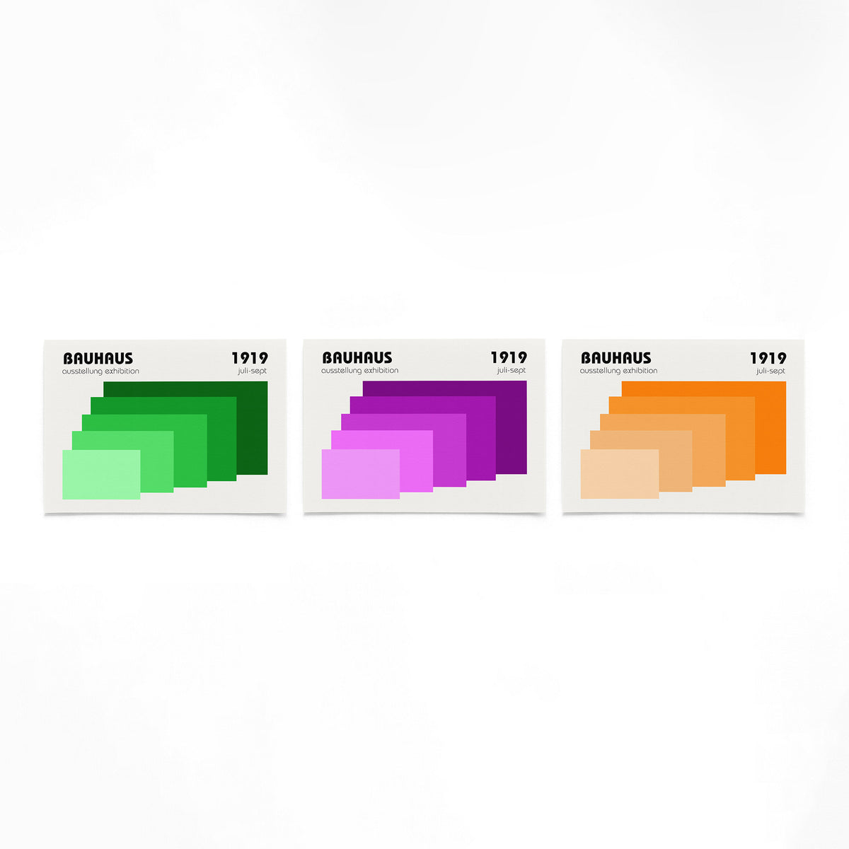 Drie landscape posters met trapsgewijze kleurvlakken als vrijstaande productfoto