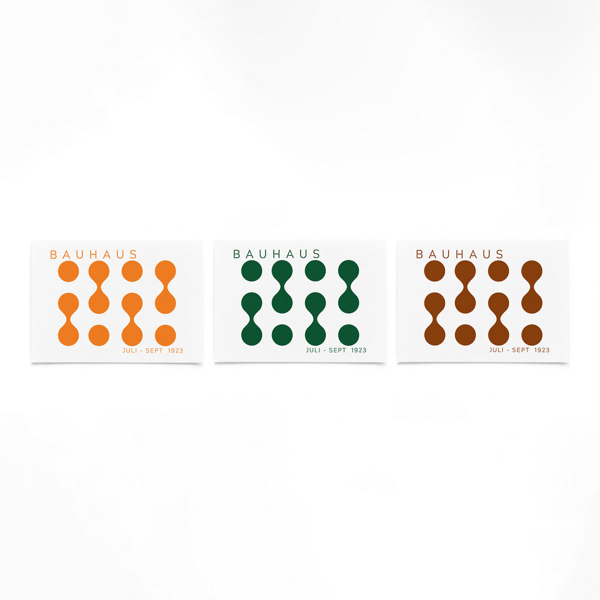 Drie landscape posters met oranje groene cirkels als vrijstaande productfoto