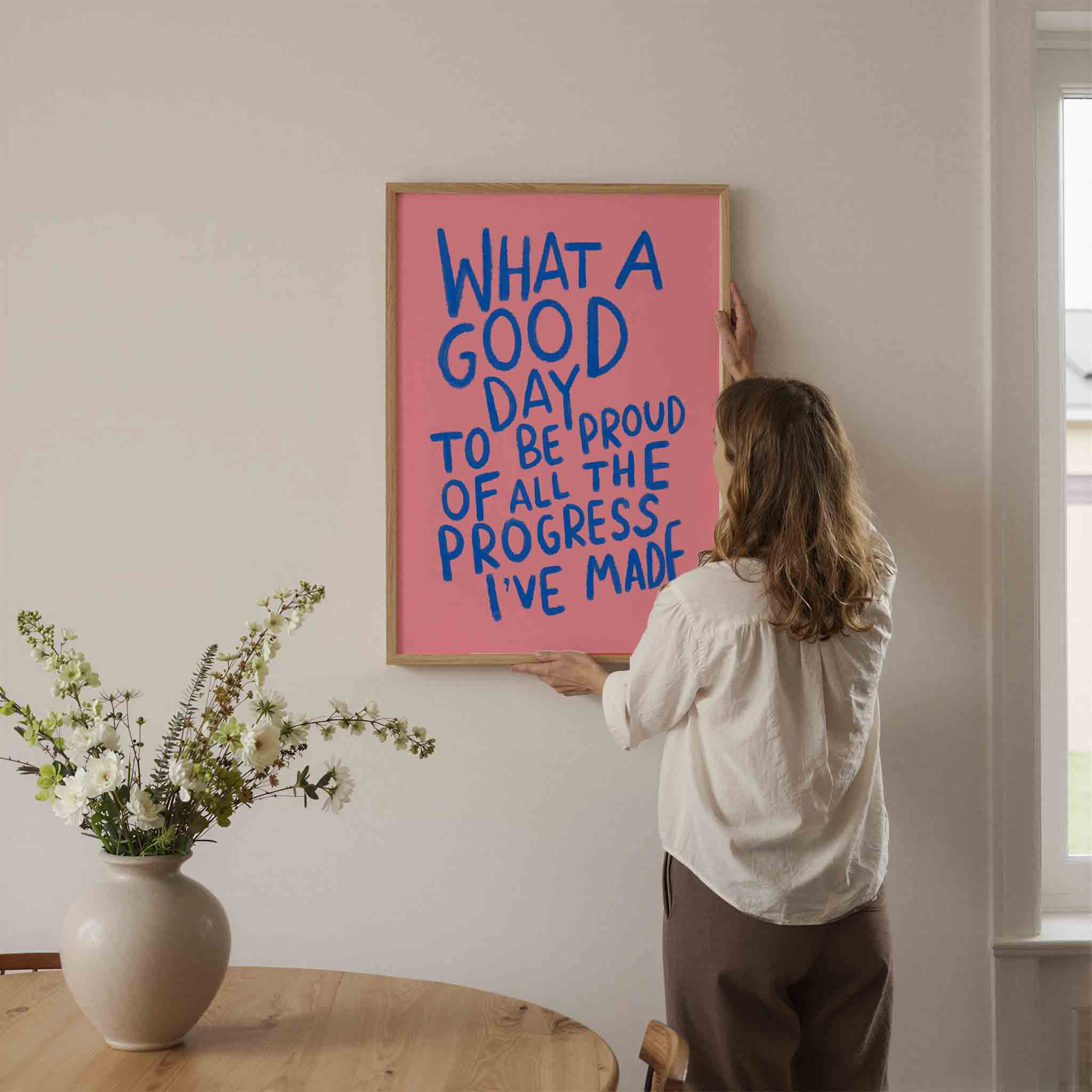 Blauwe tekst op roze achtergrond Poster